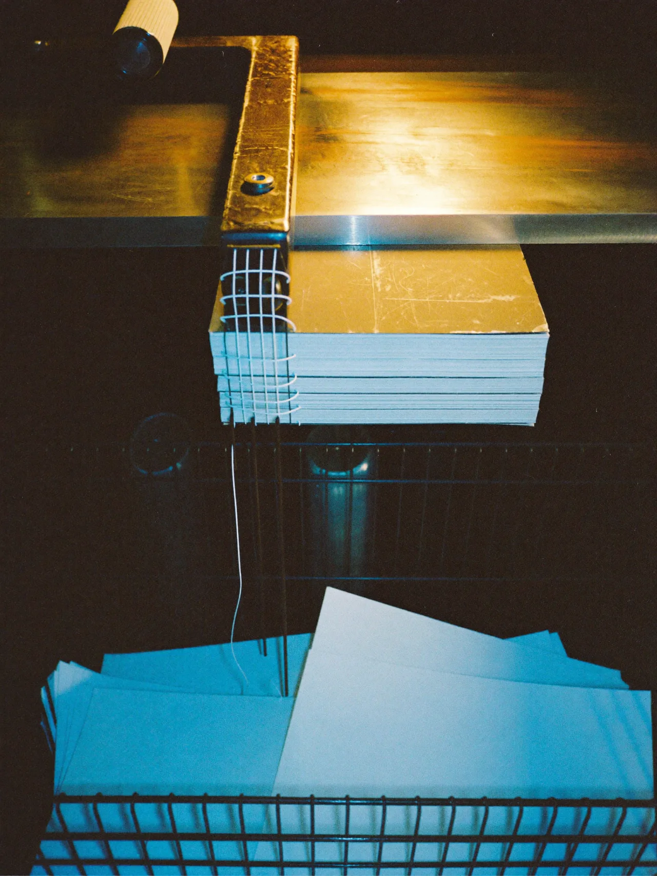 The binding stays behind; only the loose pages travel on.