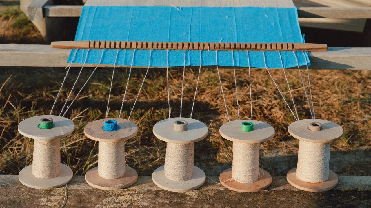 Separate threads, one shared cloth.